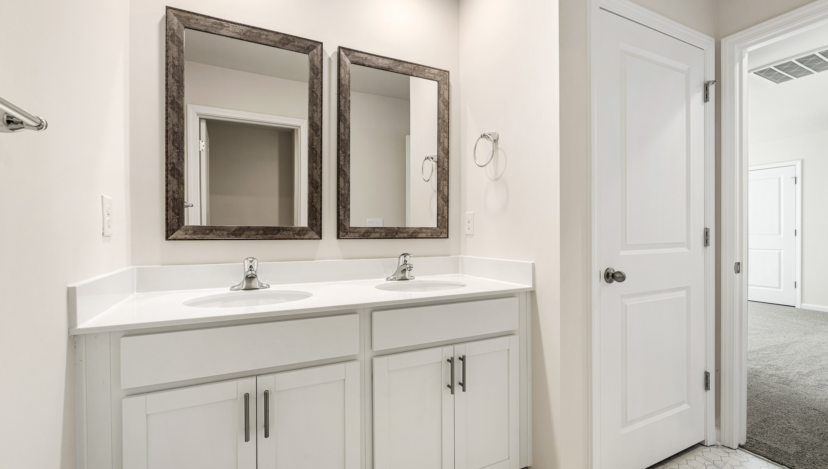 Bathroom with double vanity sink.