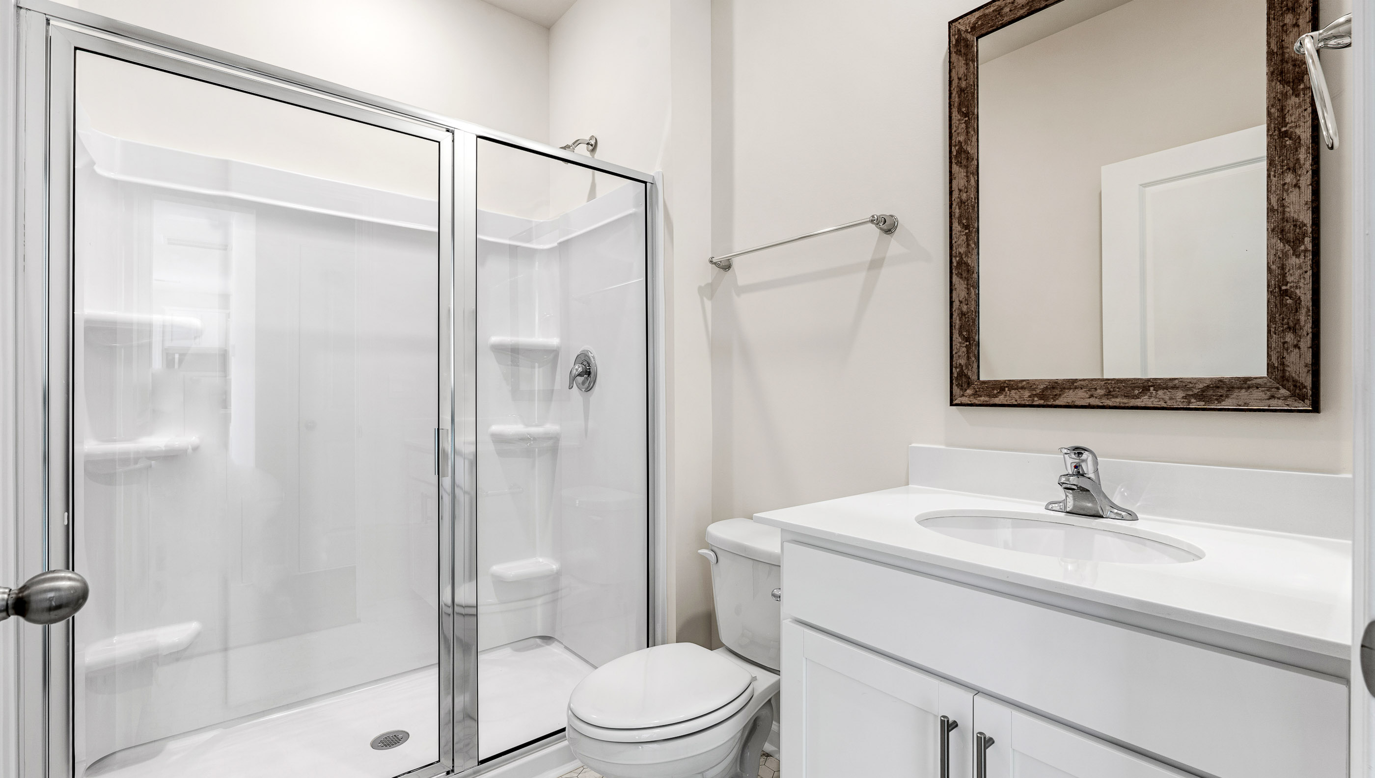 Bathroom with walk in shower.