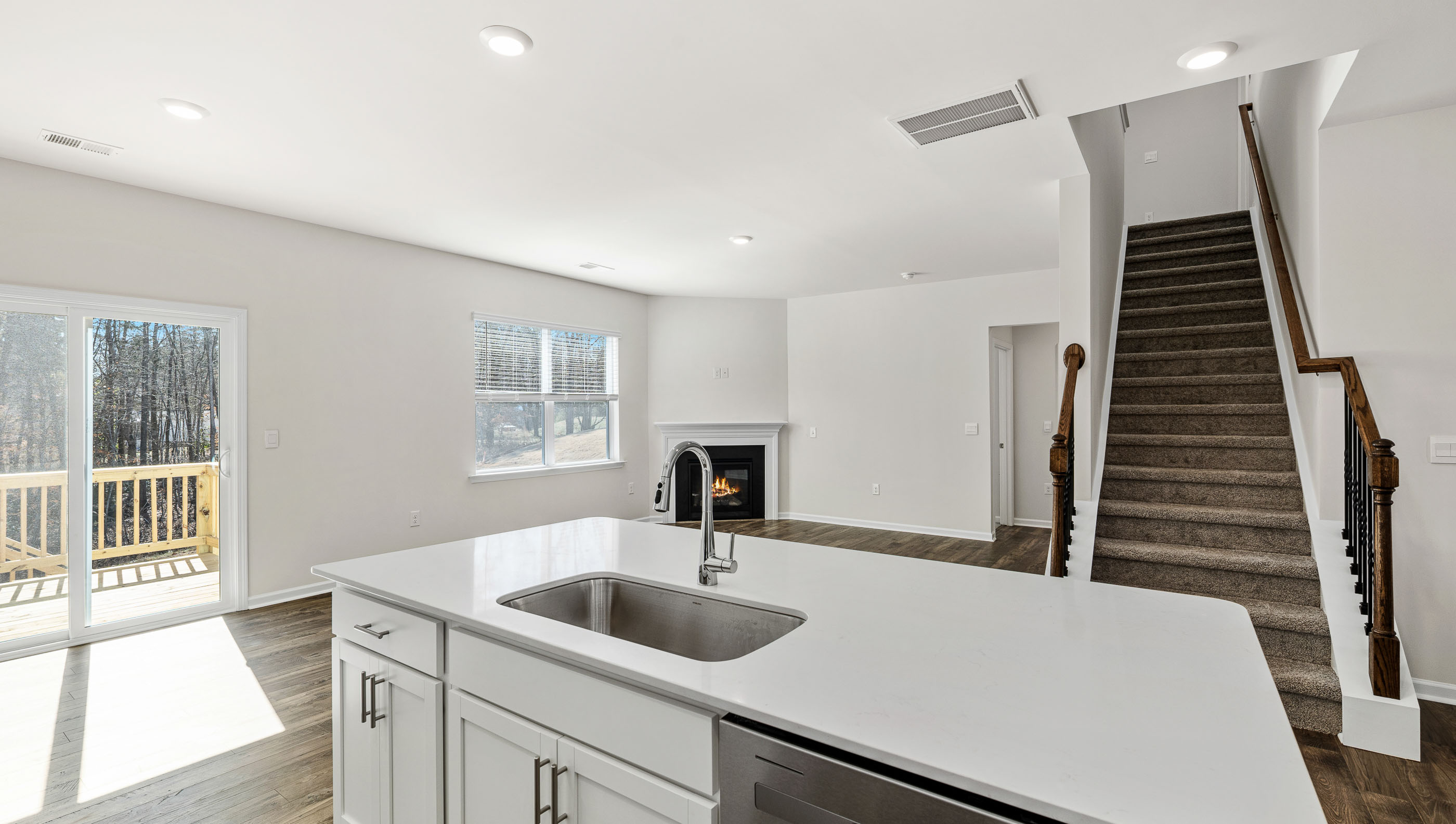 Kitchen with island and stainless steel appliances.