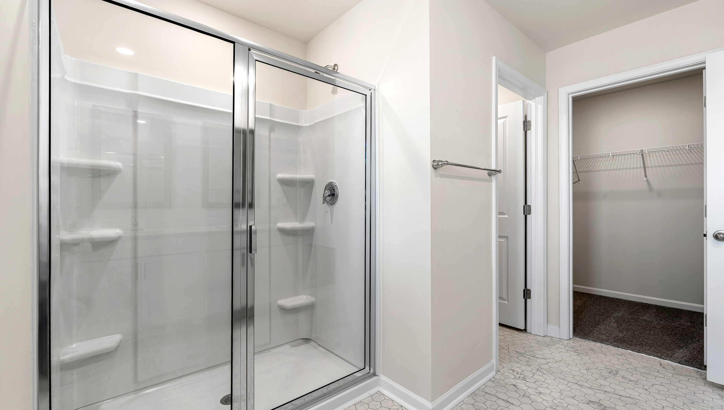Bathroom with walk in shower.