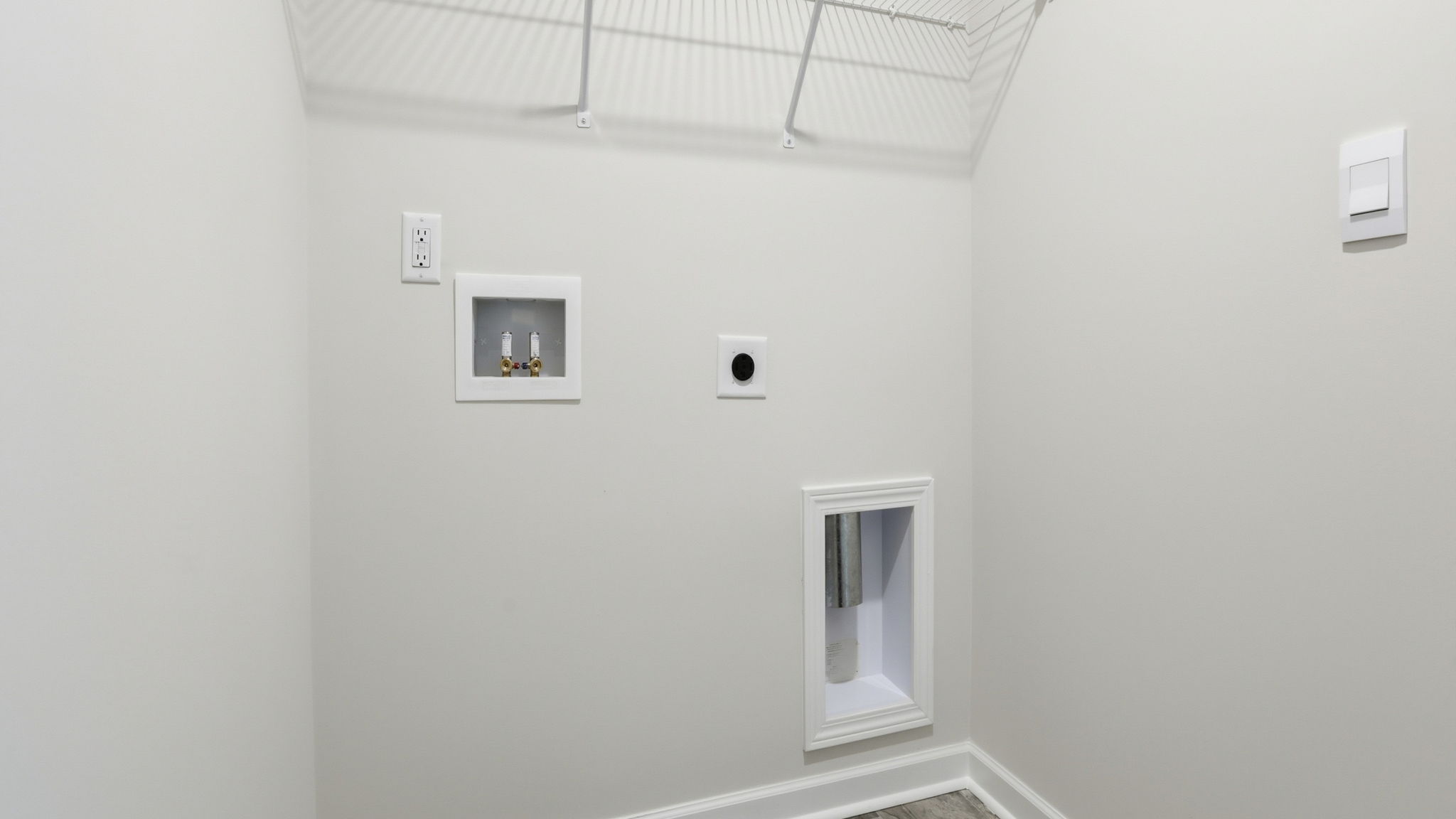 Walk-in laundry room.