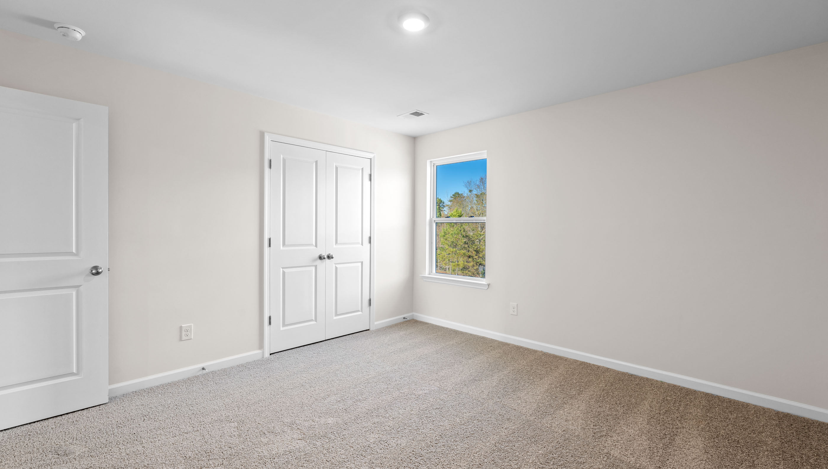 Kitchen and island with granite counter tops.
