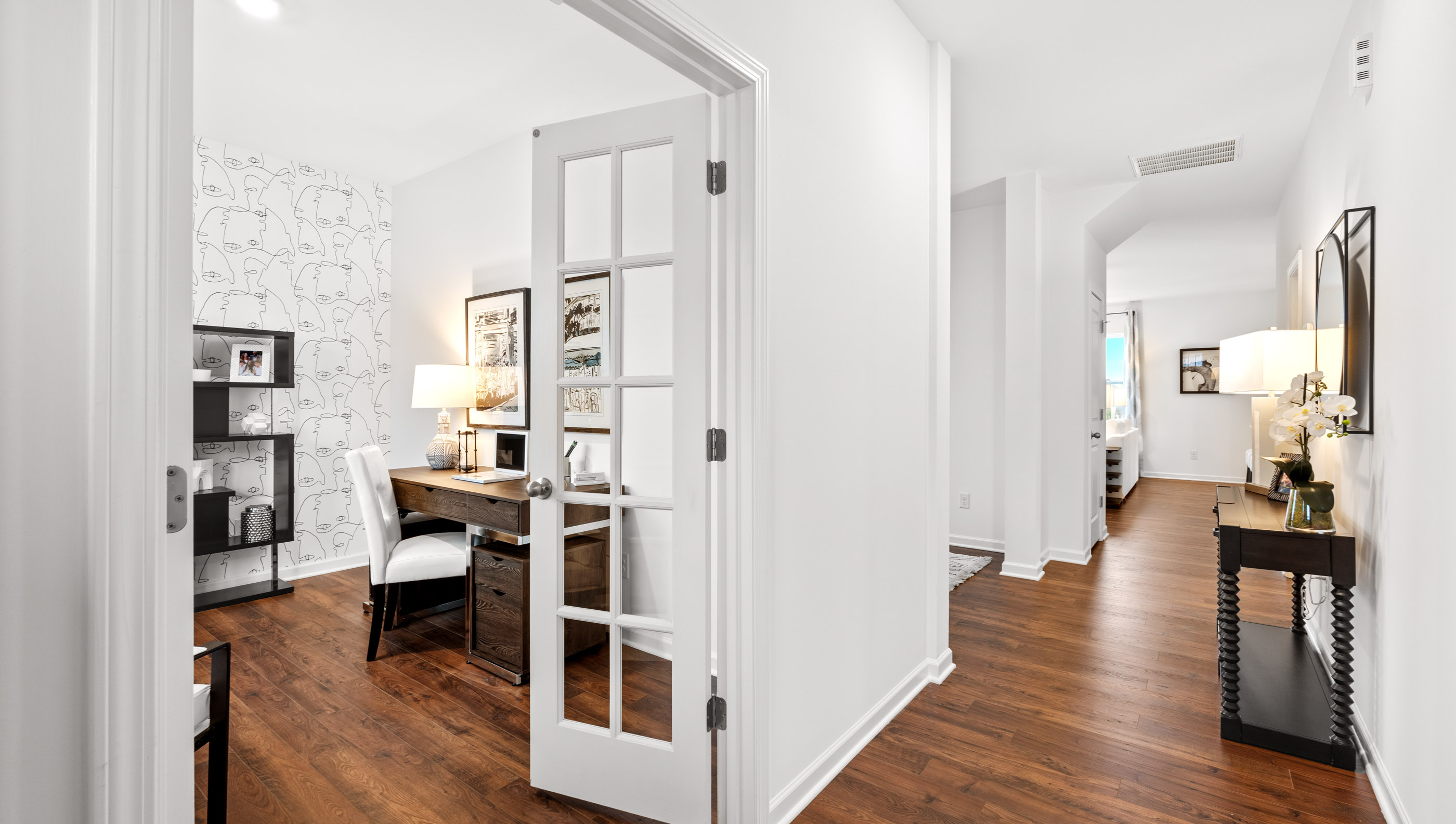 Hallway into home with flex room.