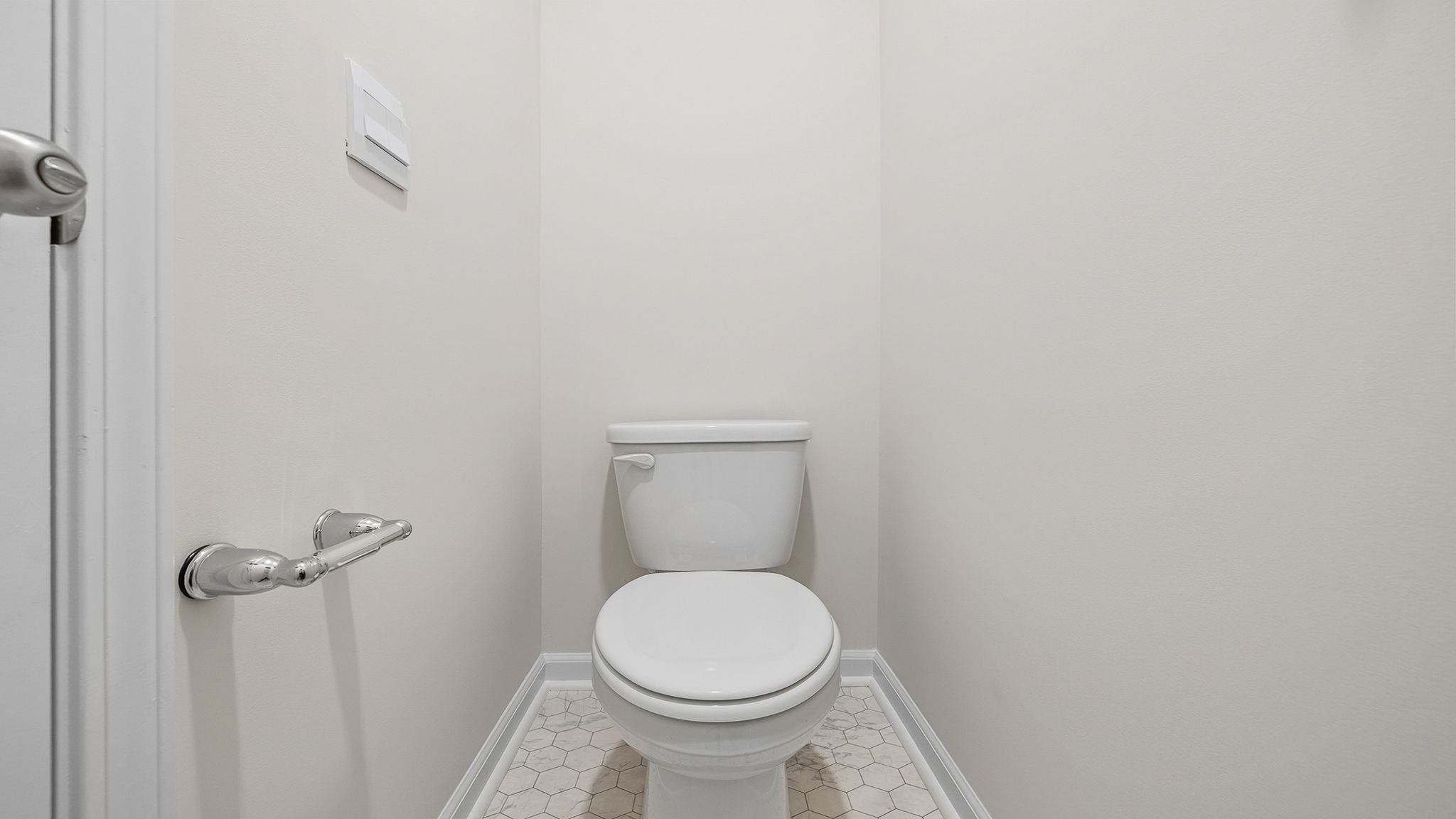 Primary bathroom with double vanity sinks.