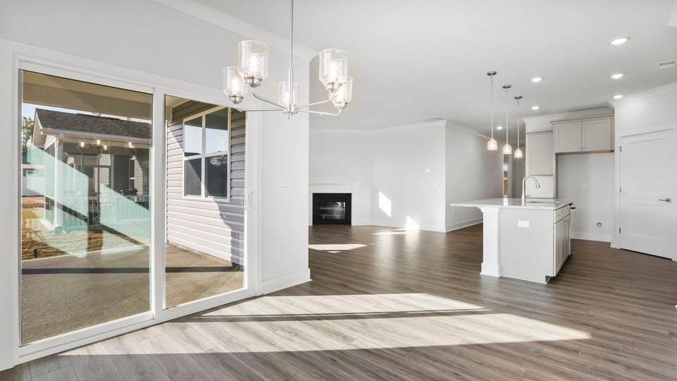 Living room with window and fireplace.