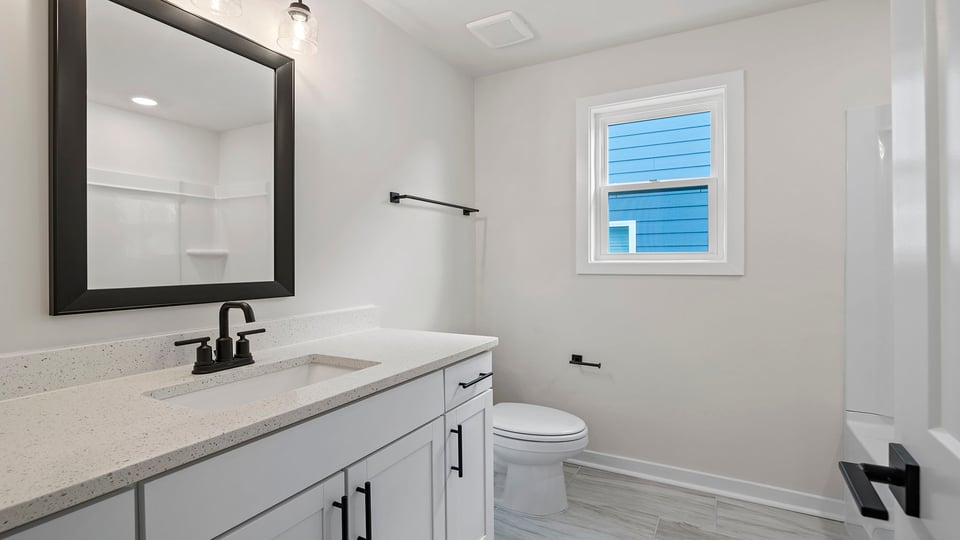 Bathroom with vanity sink.