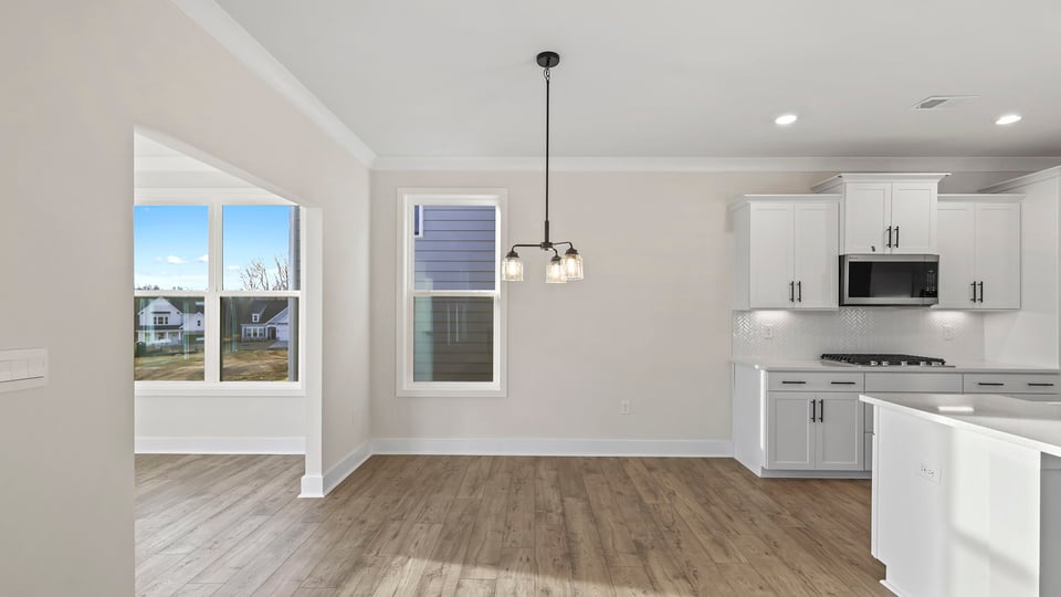 Living room with window and fireplace.