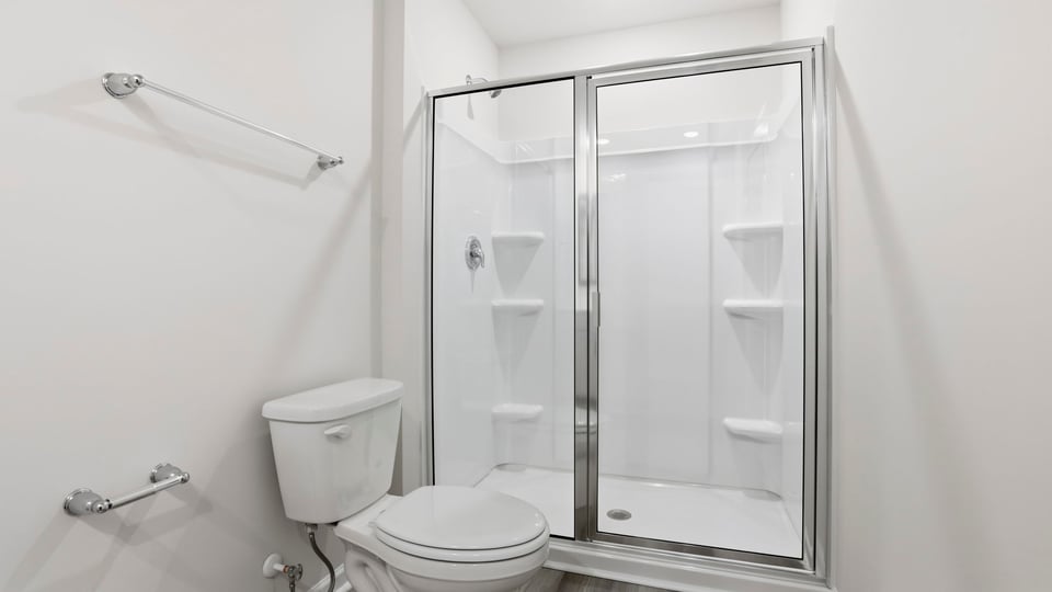 Primary bathroom with walk-in shower.