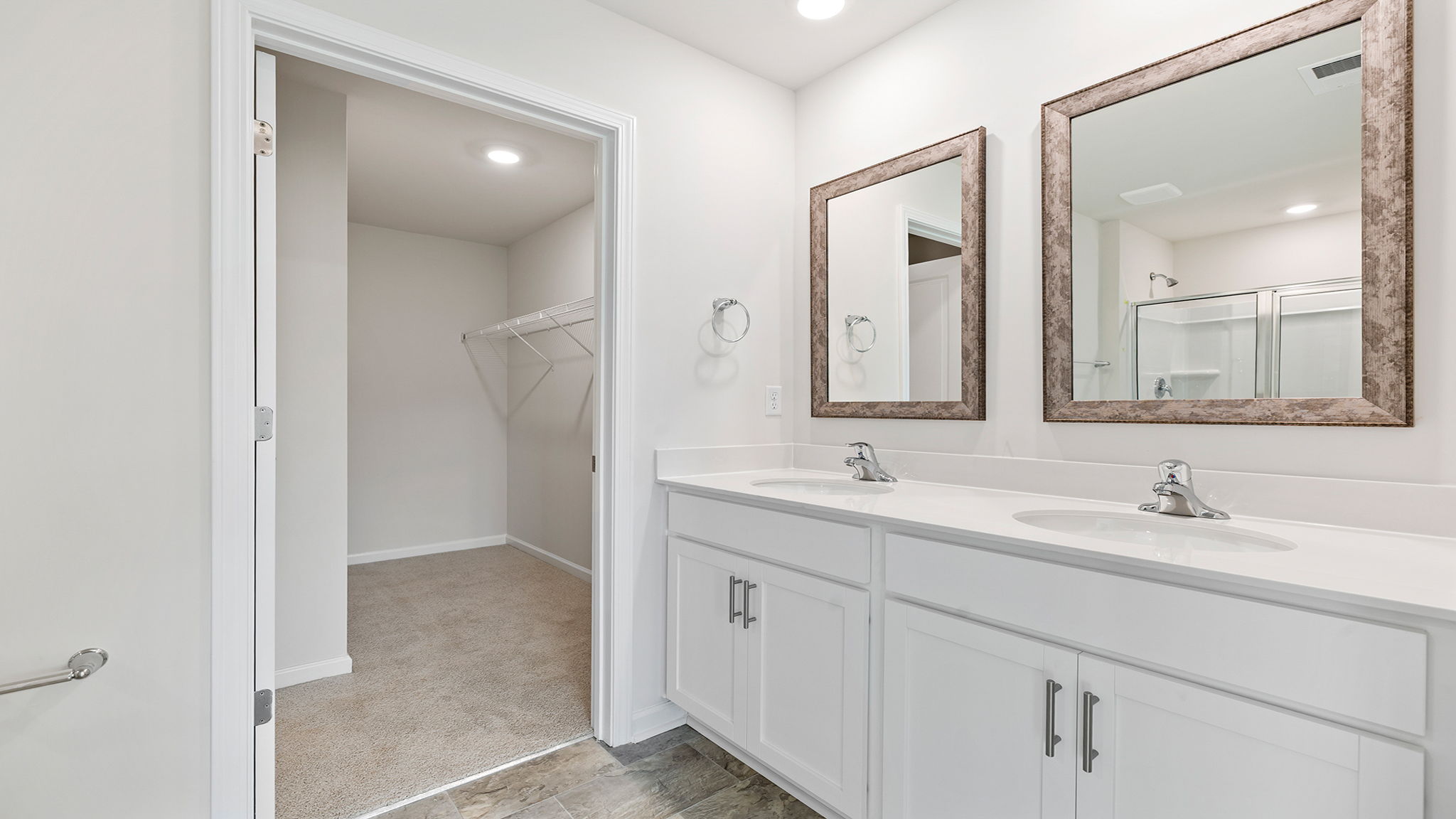 Primary bathroom with double vanity sink.