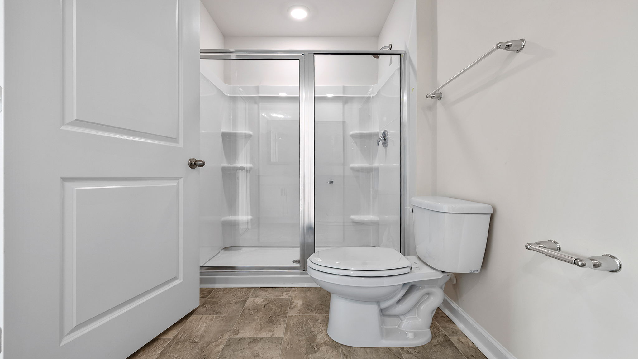 Primary bathroom with double vanity sink.