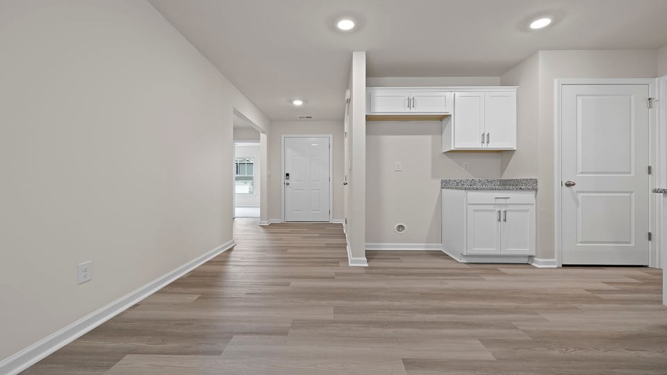 Kitchen with island and cabinets,