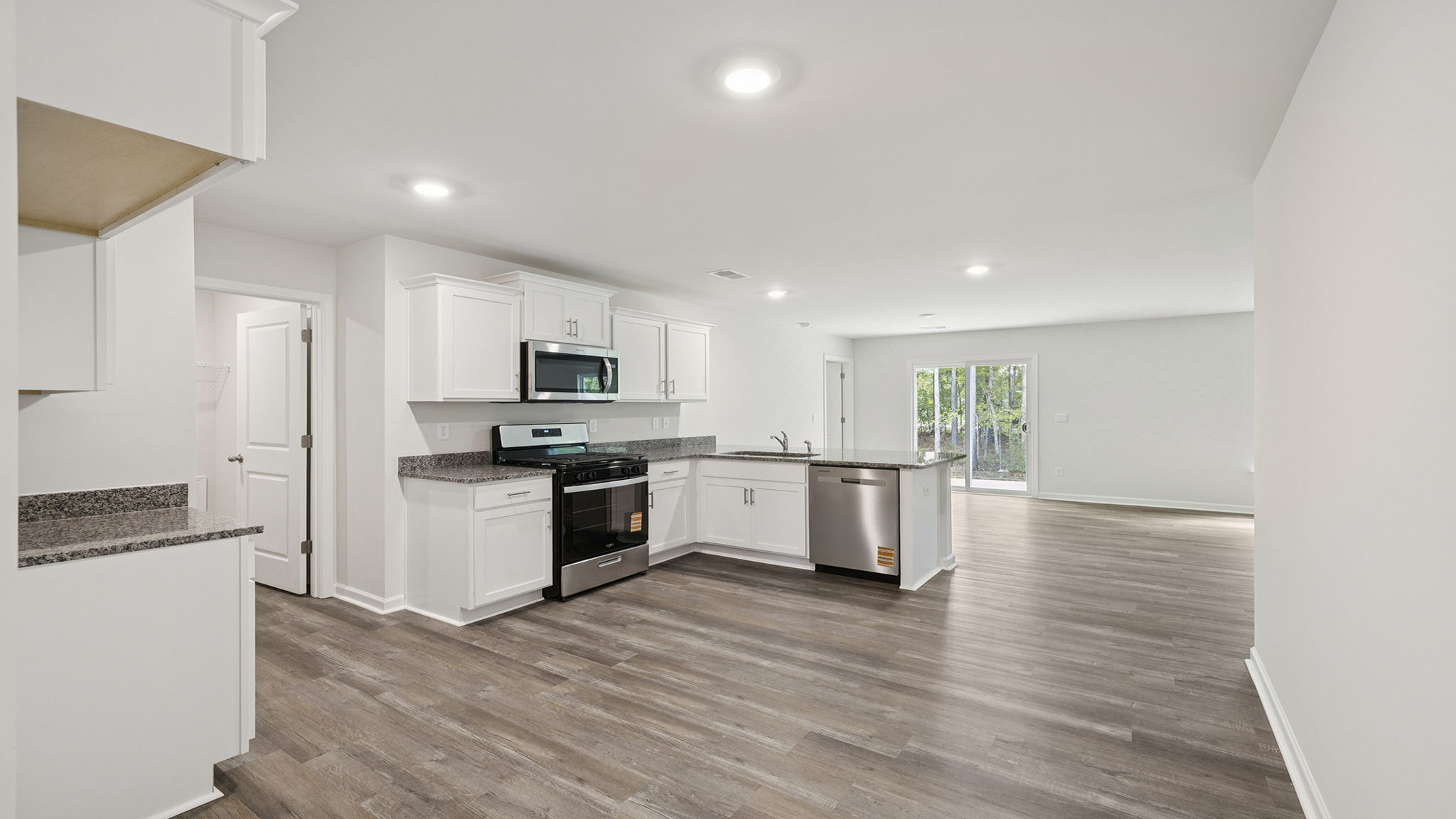 View of kitchen and dining area.