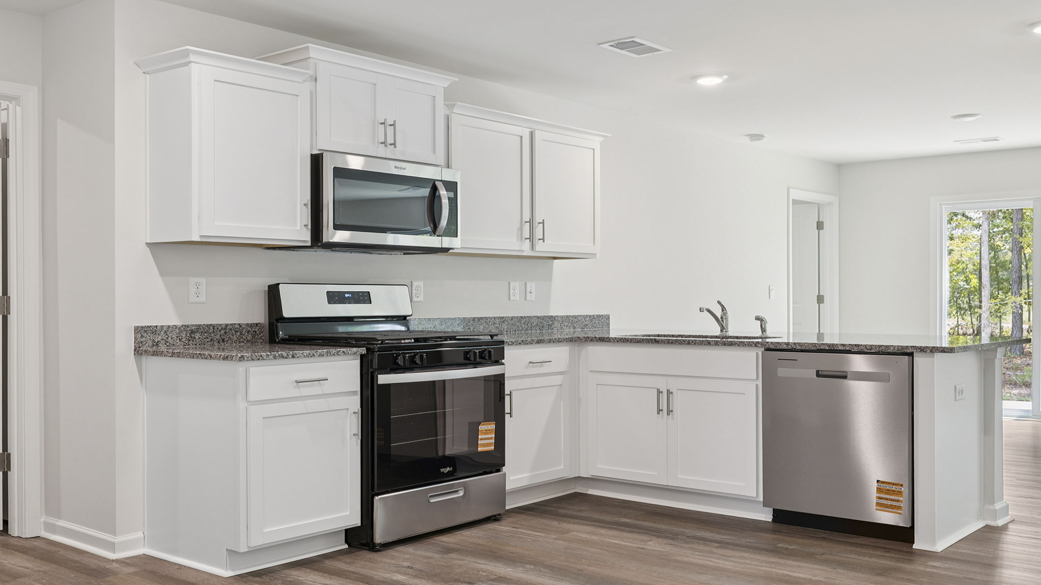 Kitchen with granite countertops.