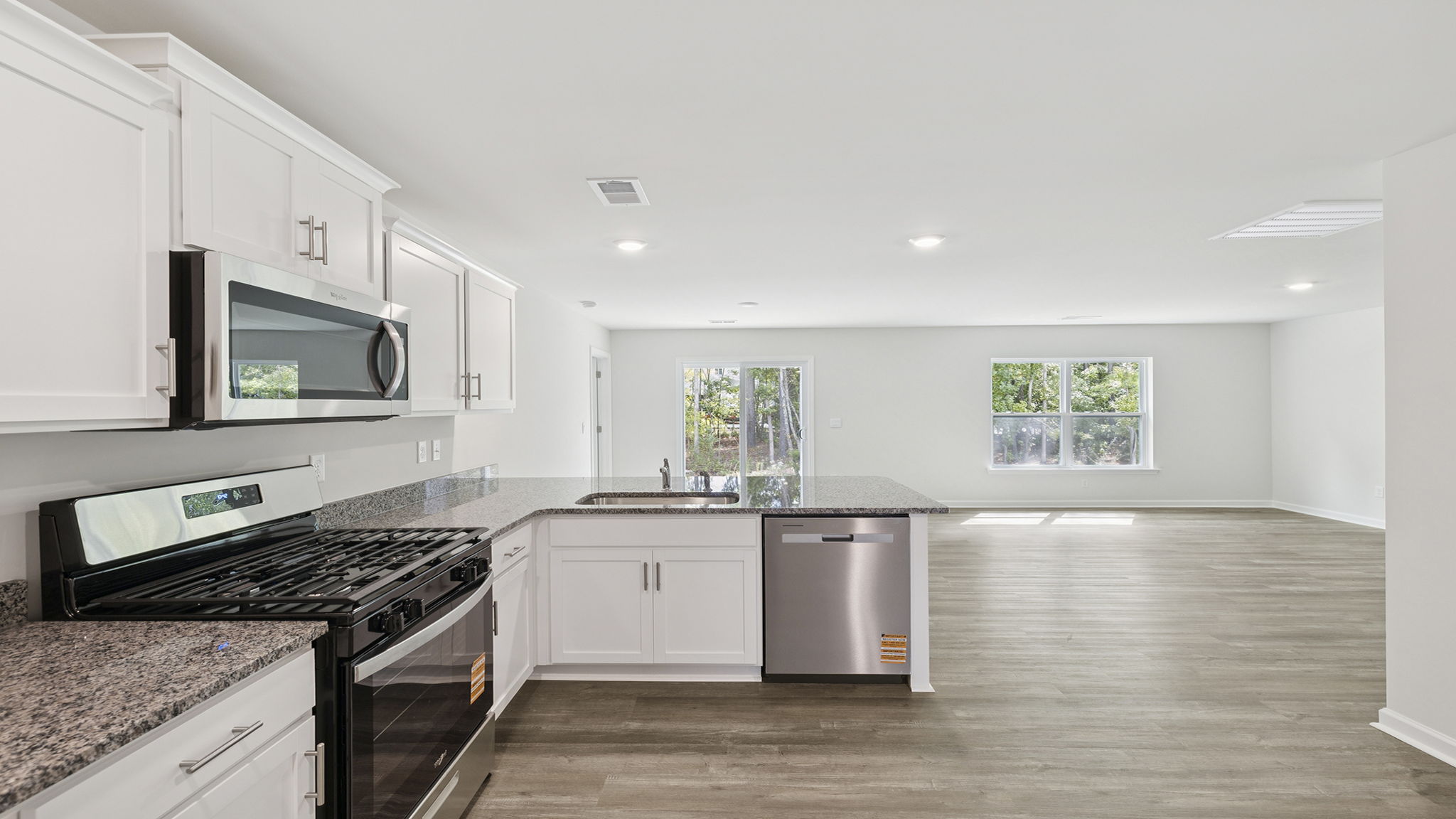View of living area from kitchen.