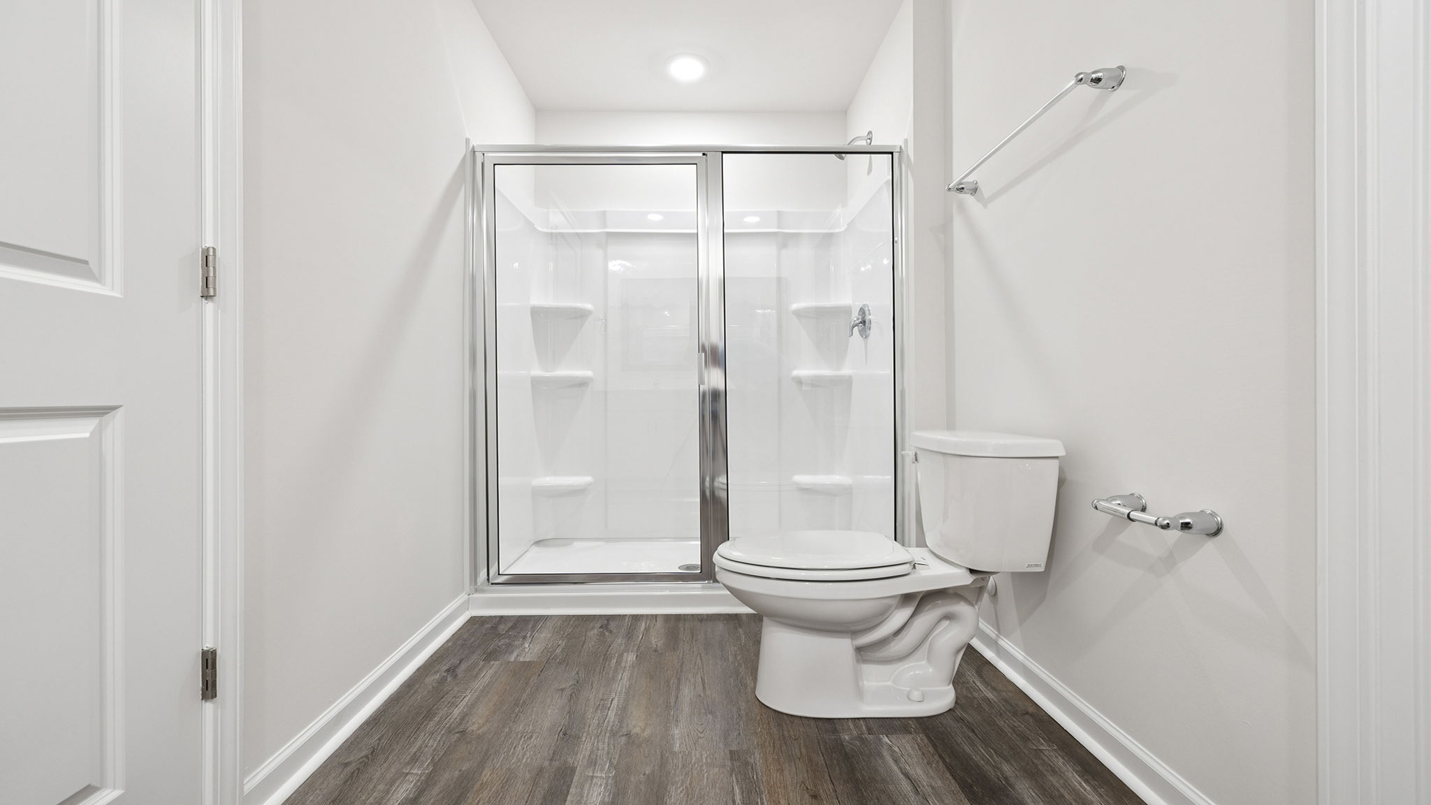 Primary bathroom with walk-in closet.