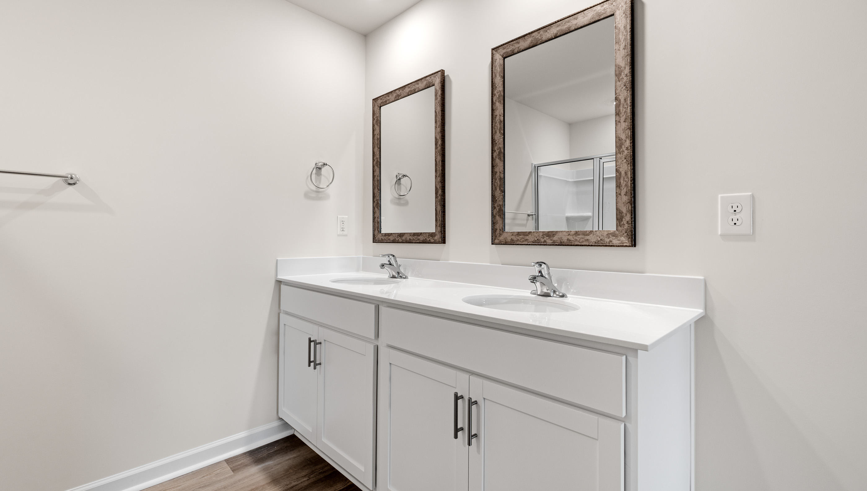 Dual sink vanity and mirrorrs.