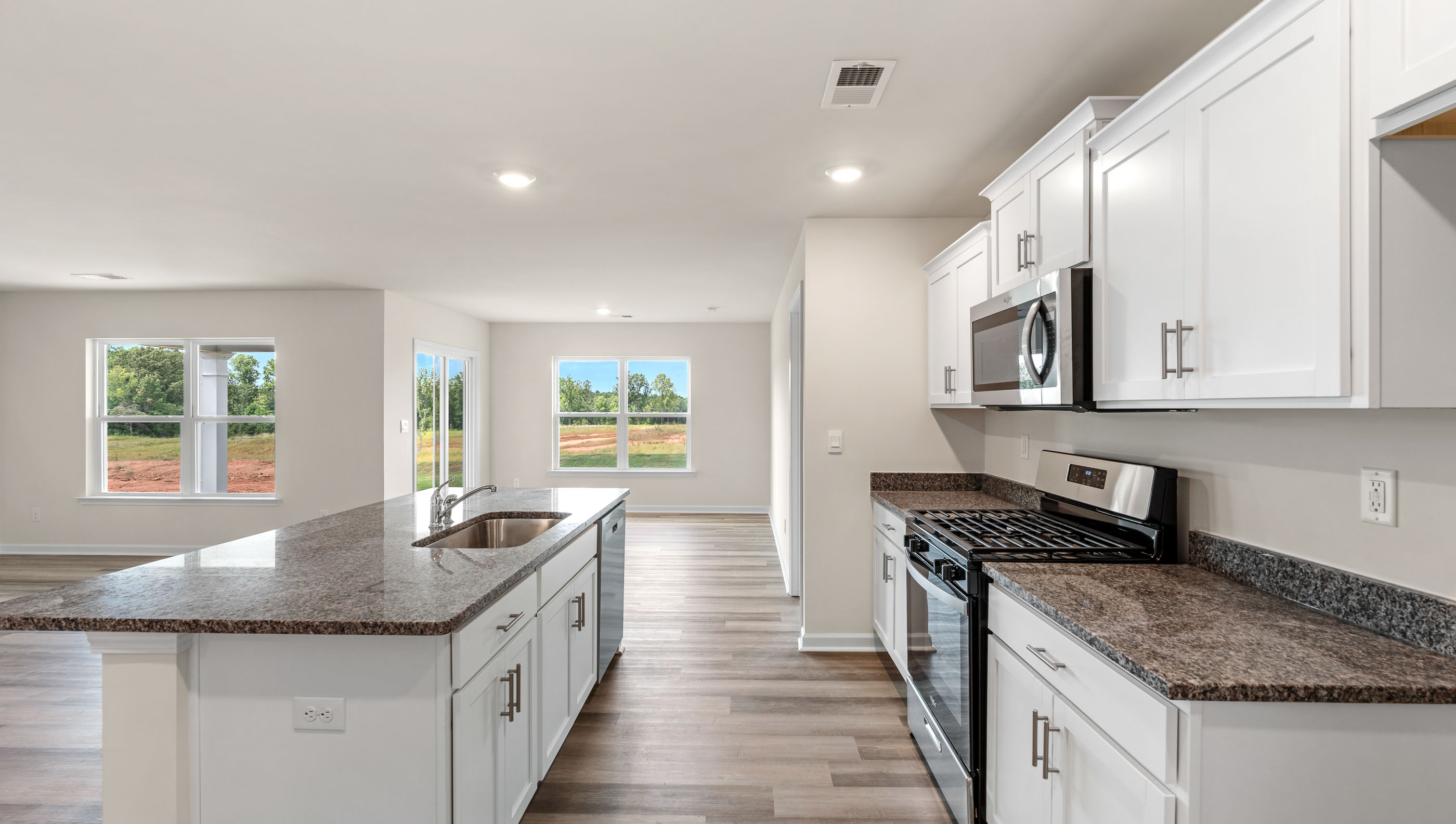 Kitchen with quartz countertops.