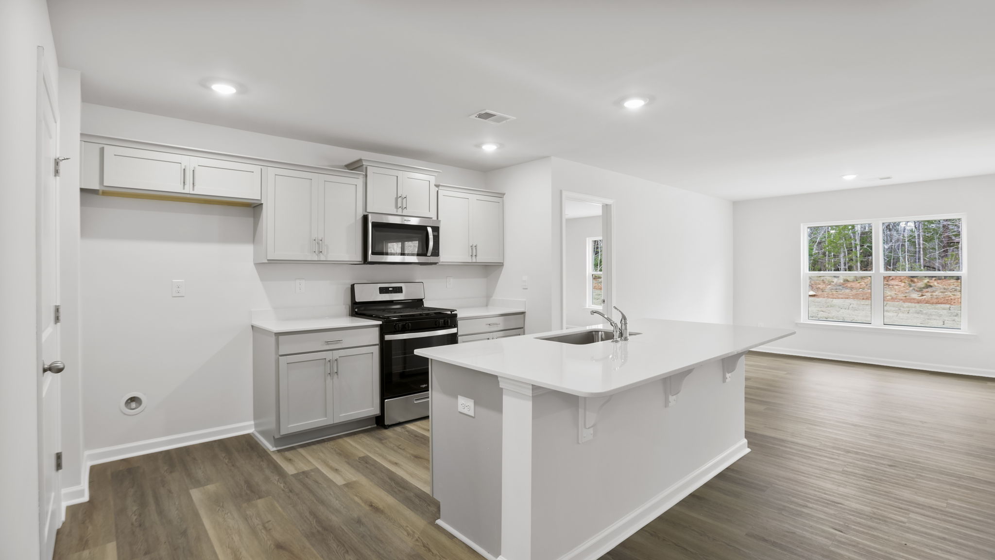 View of kitchen and dining area.