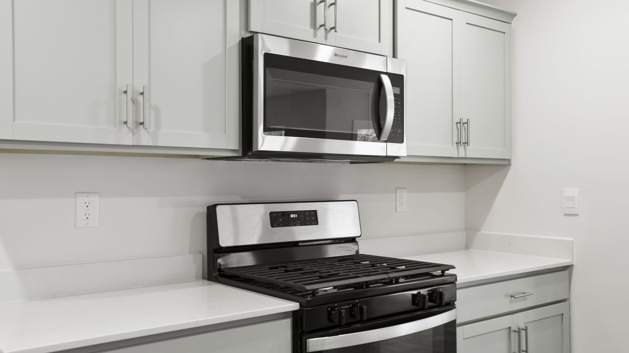 Kitchen has stainless steel appliances.
