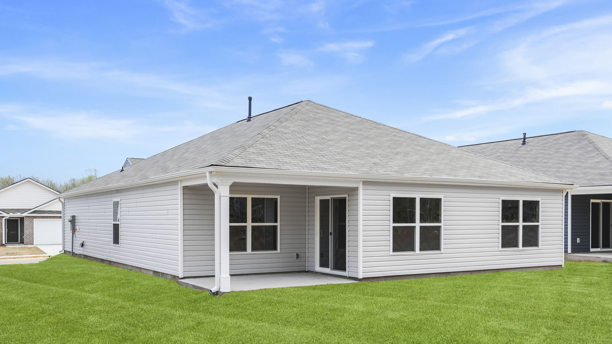 Back exterior view of the Aria with covered porch.