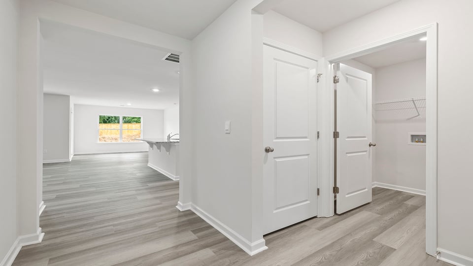 View of hallway and location of the laundry room.