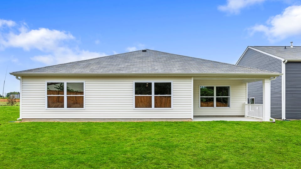 Back exterior view of the Aria with covered porch.