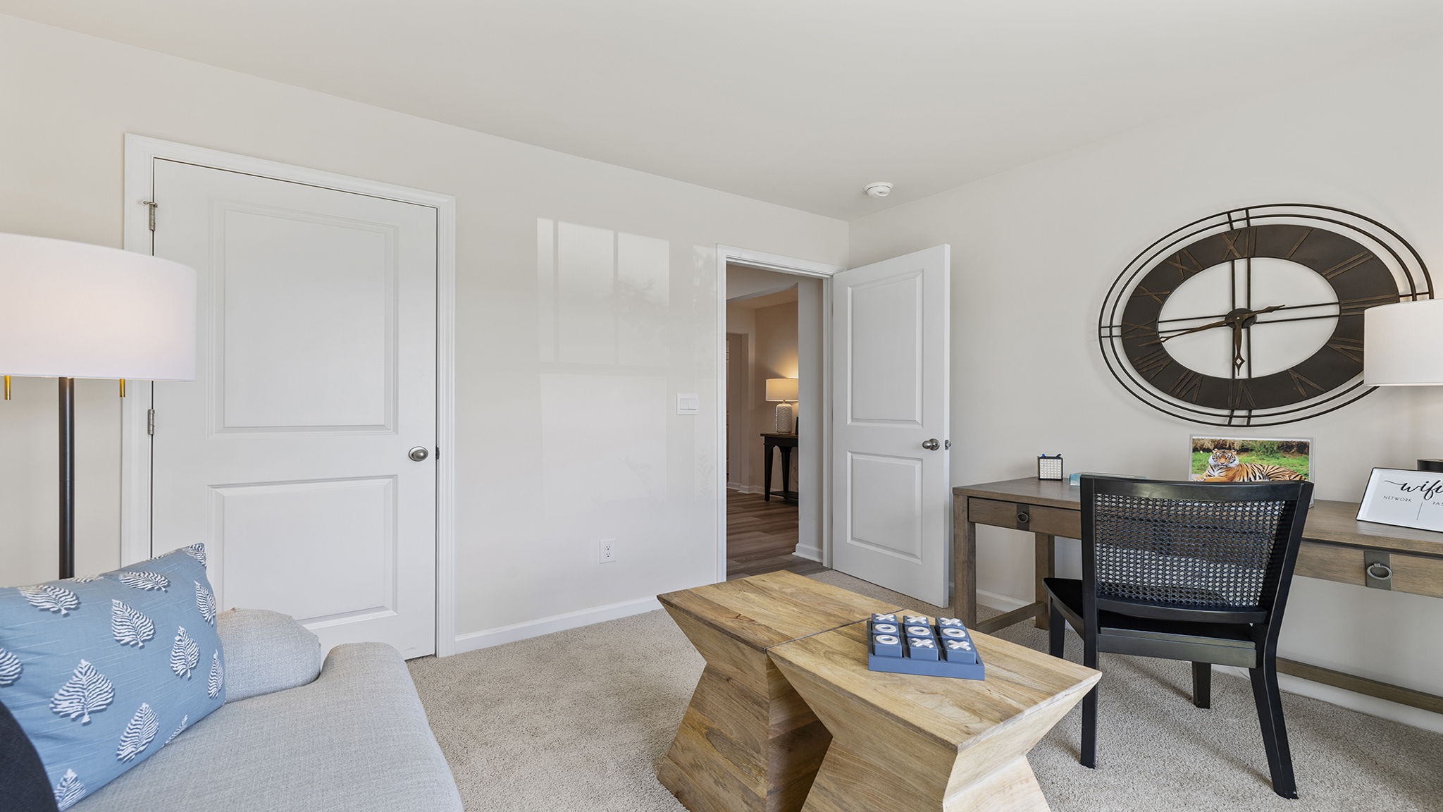 Bedroom with carpet and window.