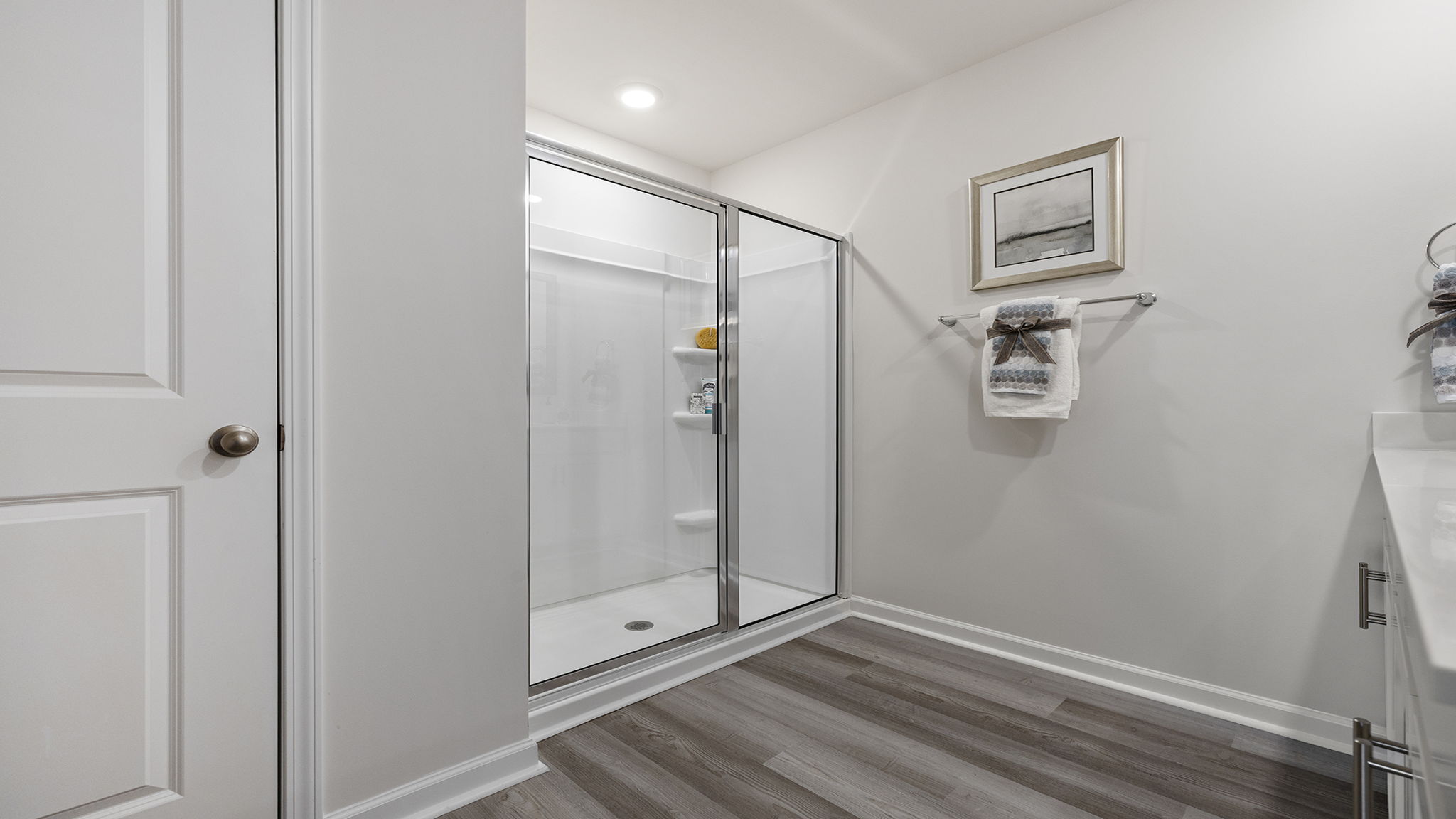 Primary bathroom with double vanity sinks.