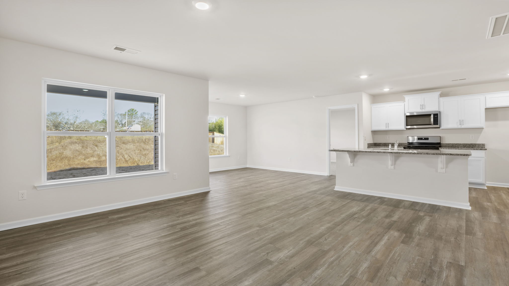 View of open kitchen and dining area.