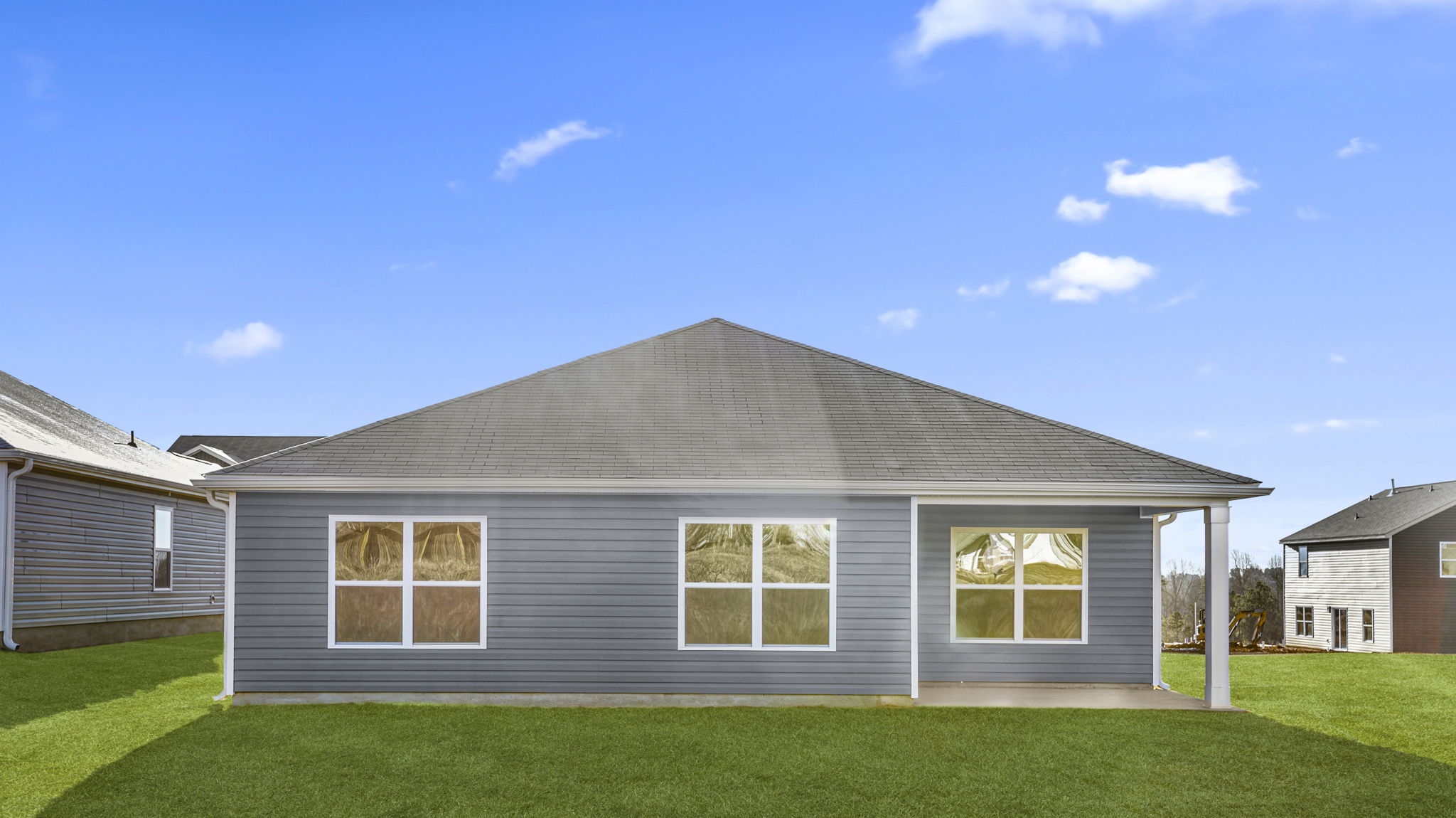 Back exterior view of the Aria with covered porch.