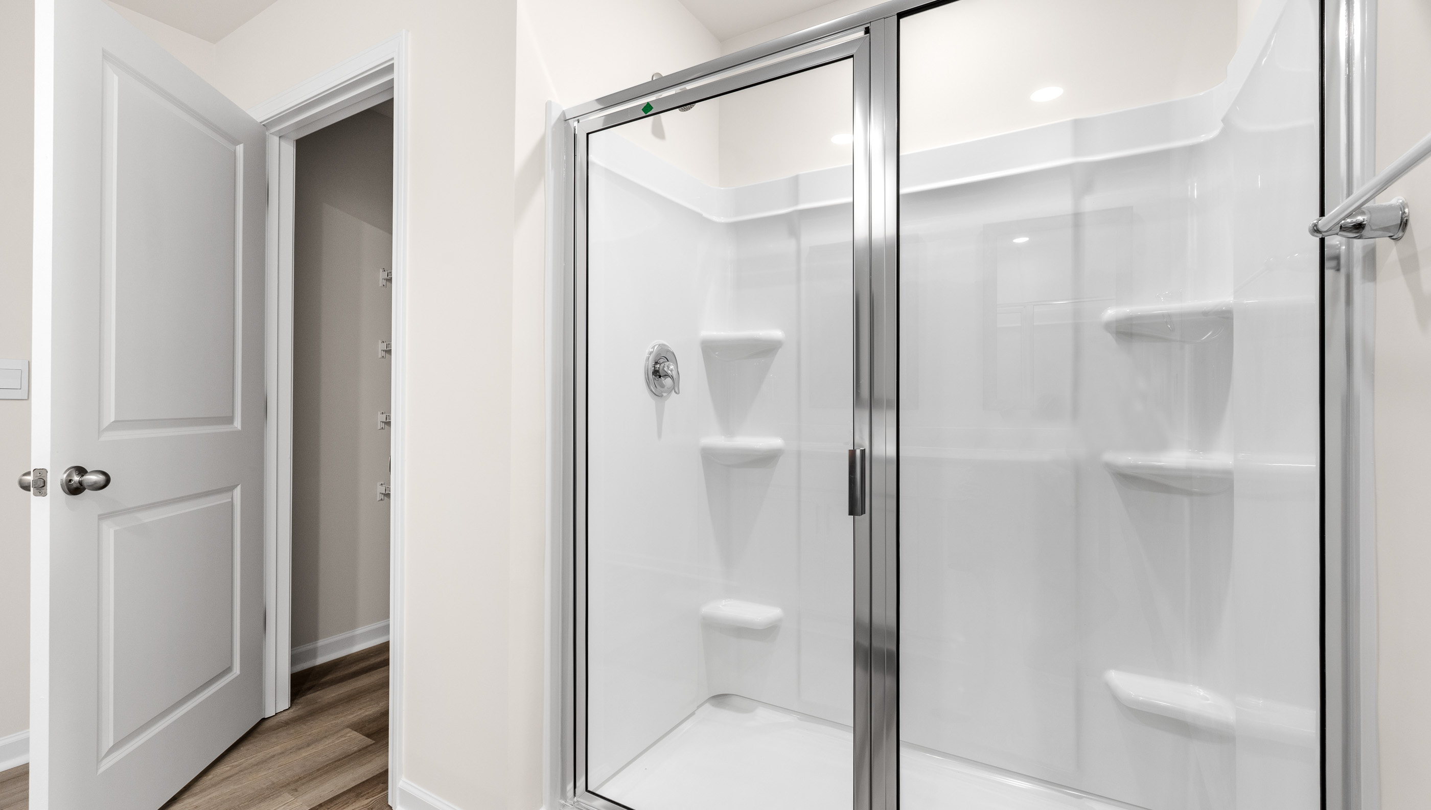 Primary bathroom with walk-in shower.