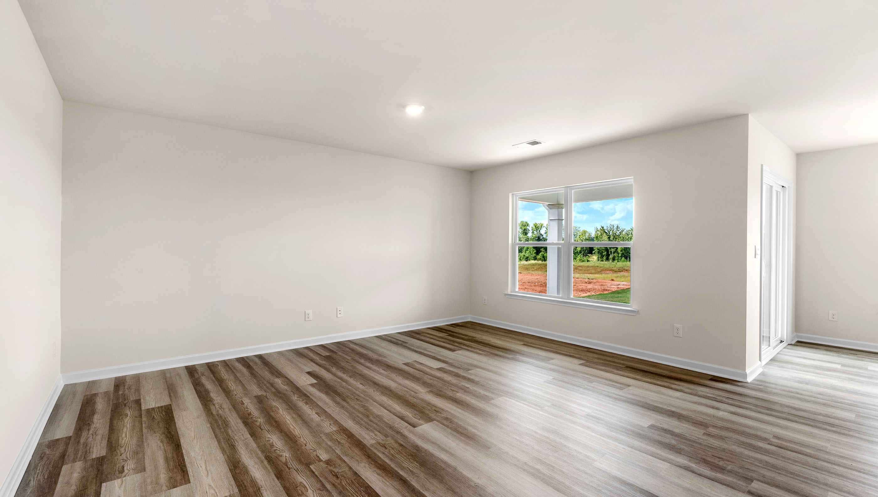 Living room with large windows.