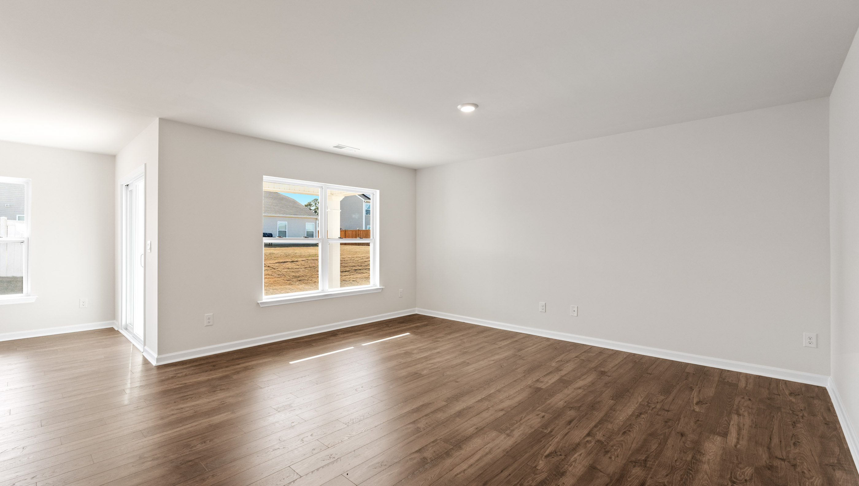 Family room with lots of windows.