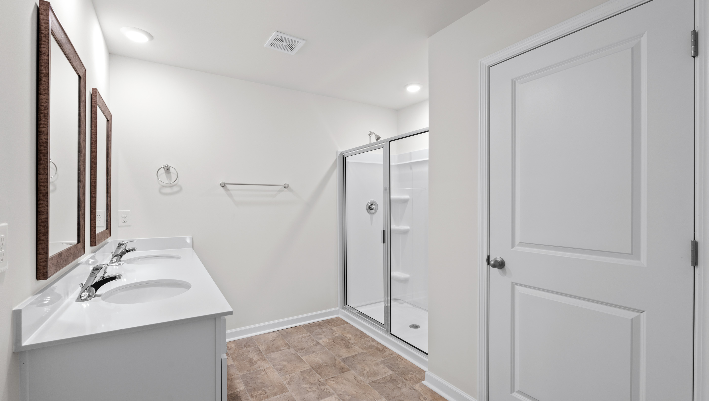 Primary bathroom with walk-in shower.