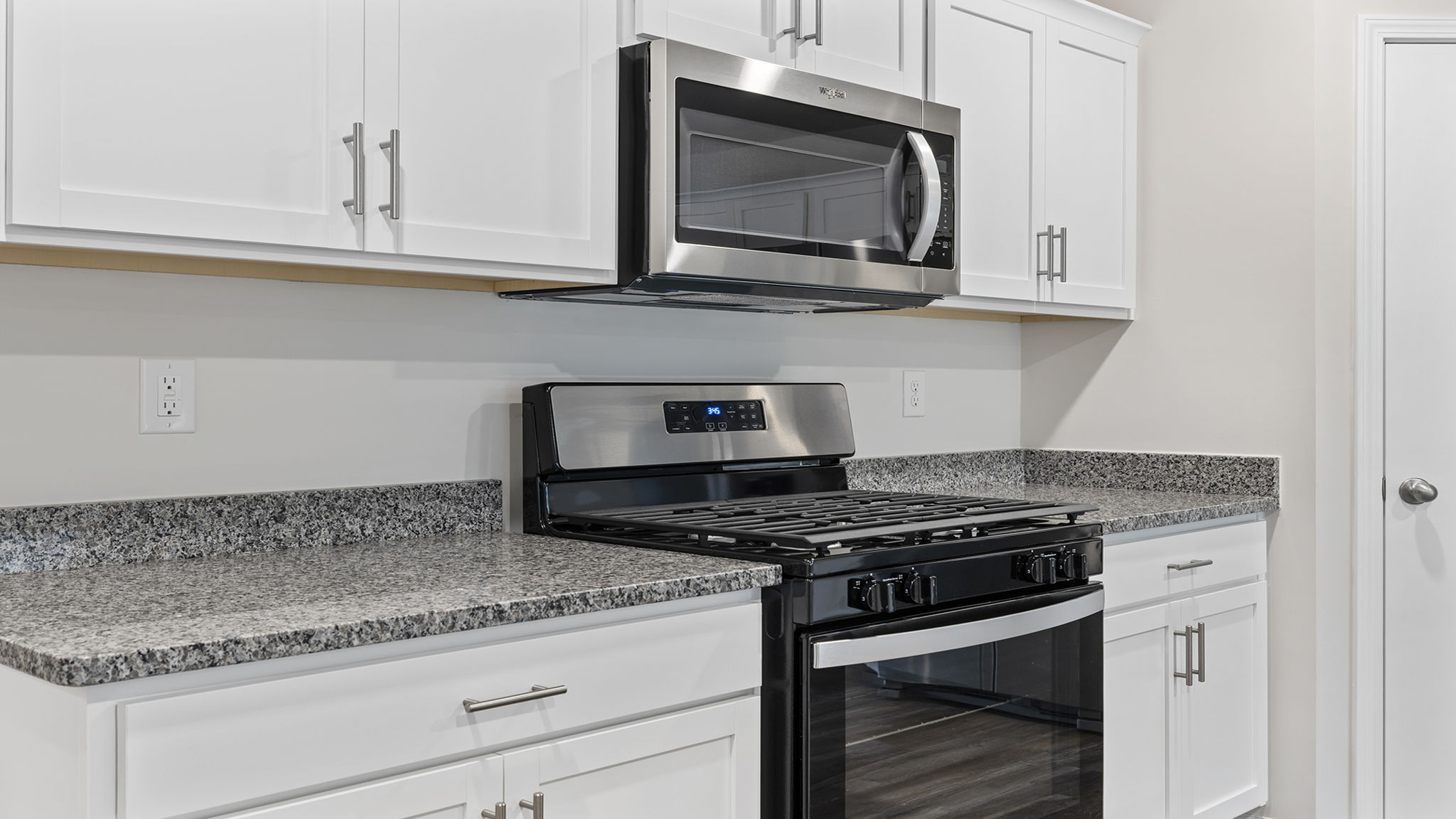 Gas stove and built-in microwave.