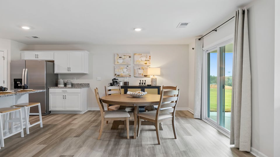Kitchen with island and cabinets.