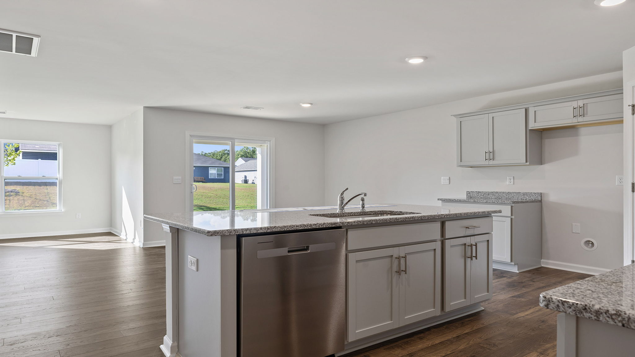 Kitchen island with granite countertops.