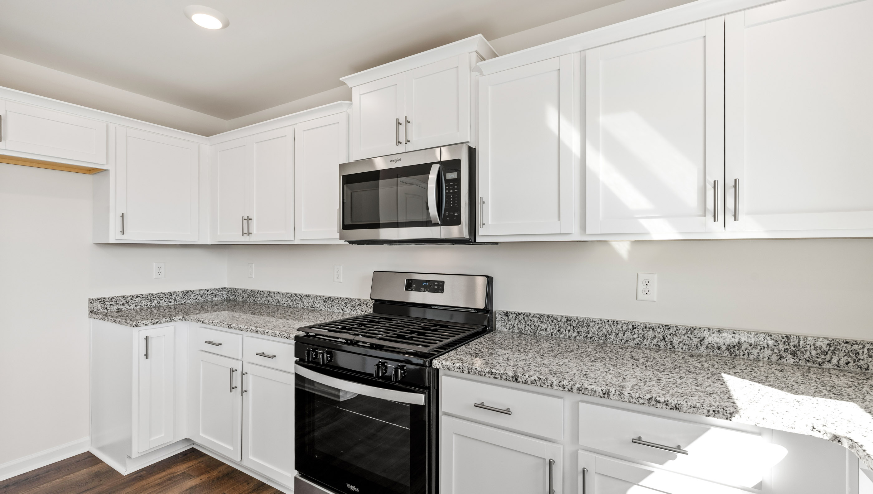 Kitchen with stainless steel appliances.
