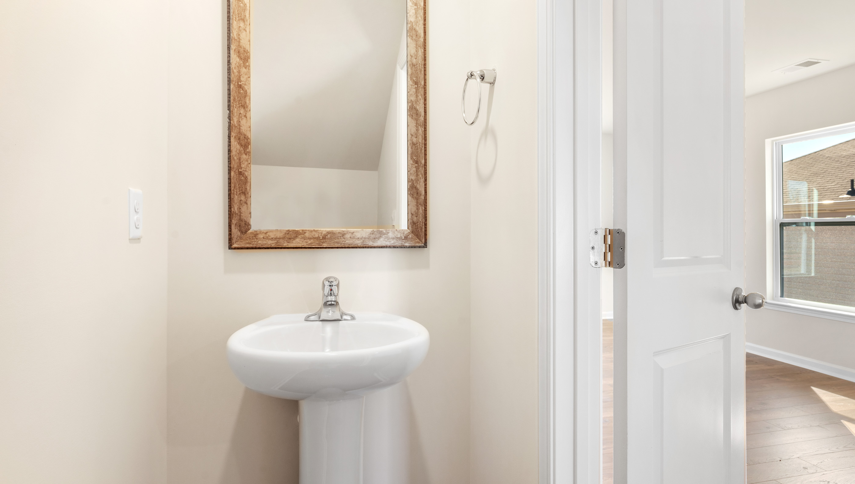 Bathroom with toilet and sink.