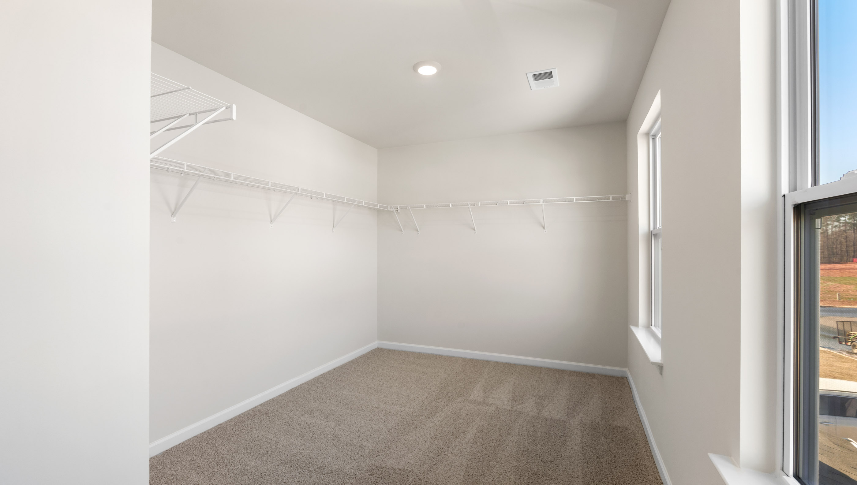 Closet with hanging storage racks,