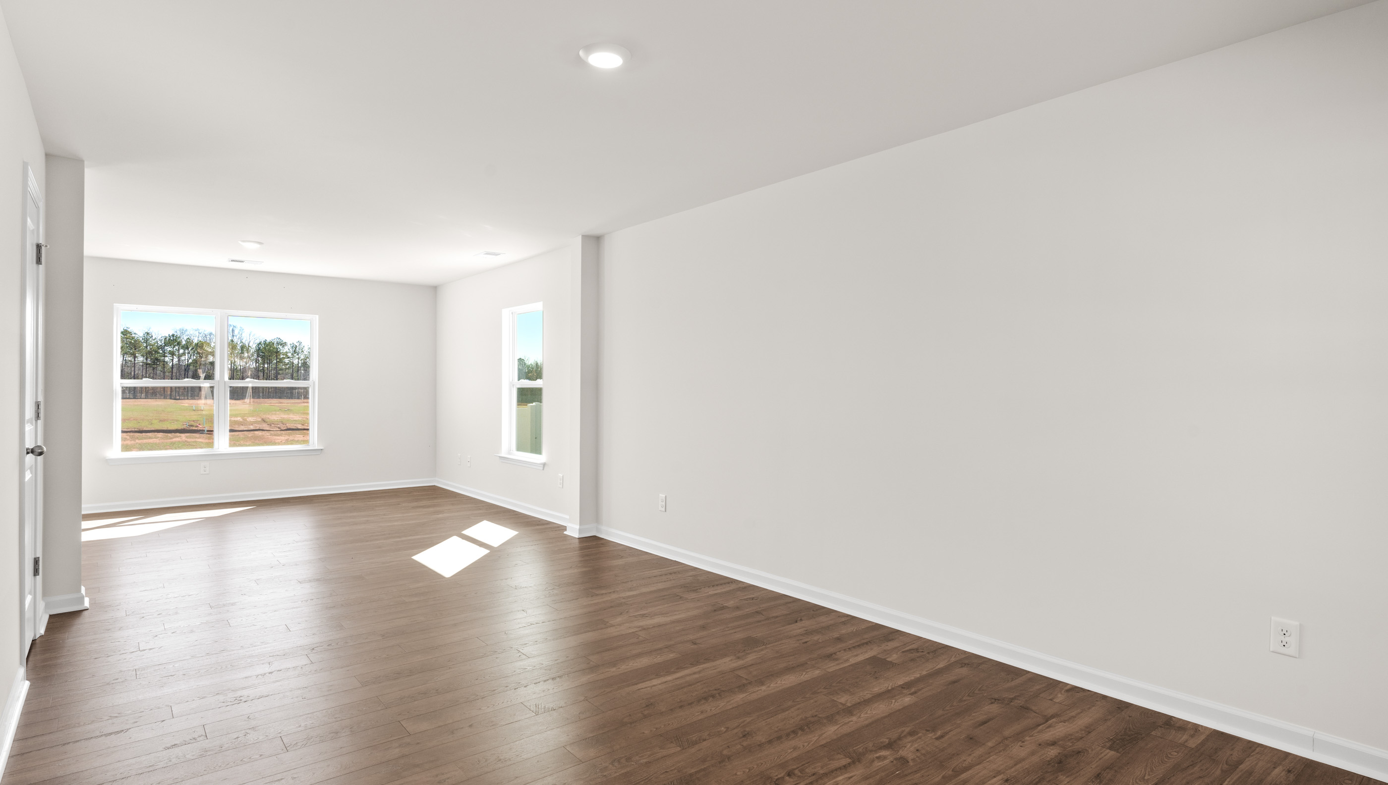 Family room with windows.