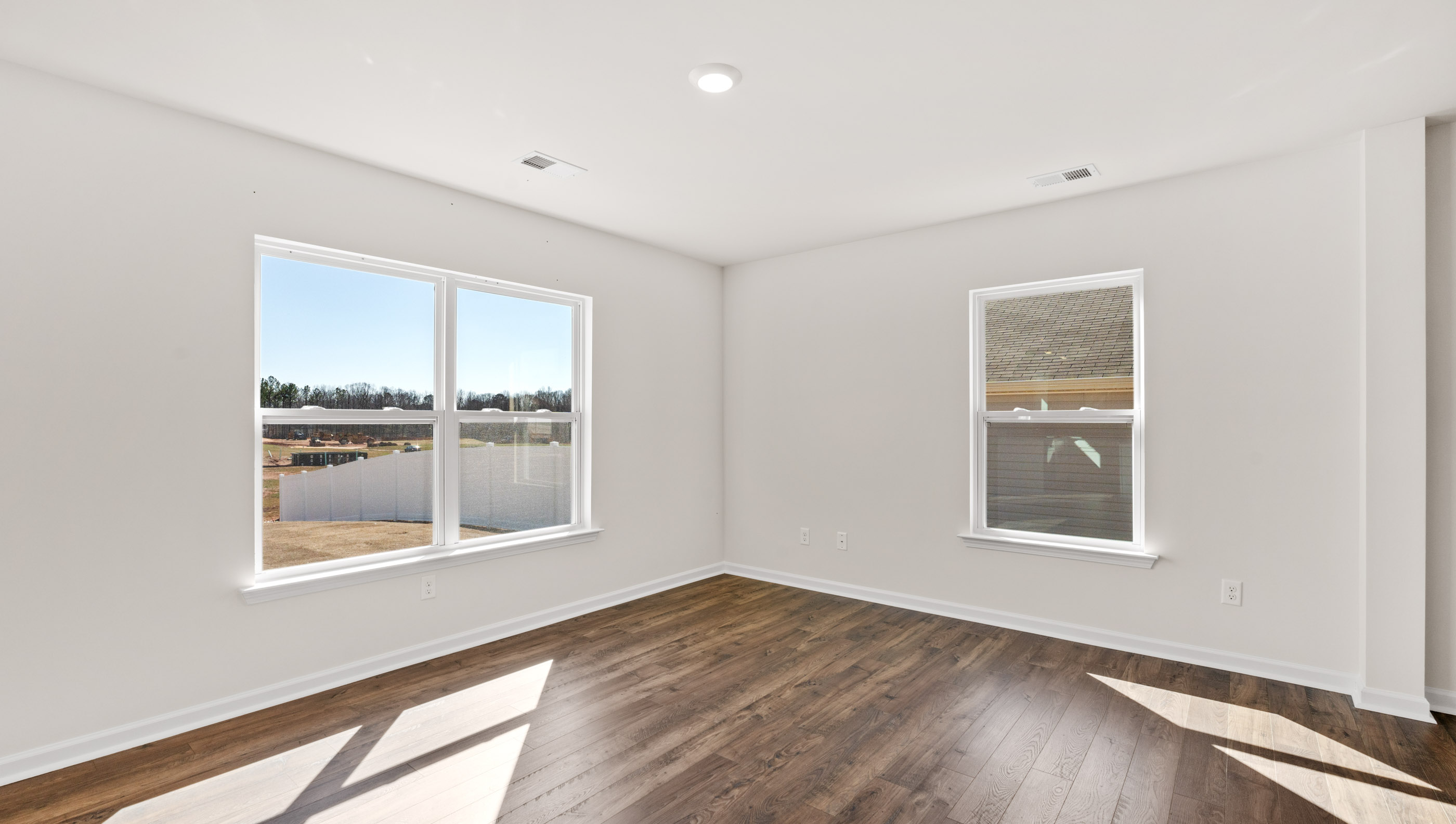 Family room with view of the kitchen.