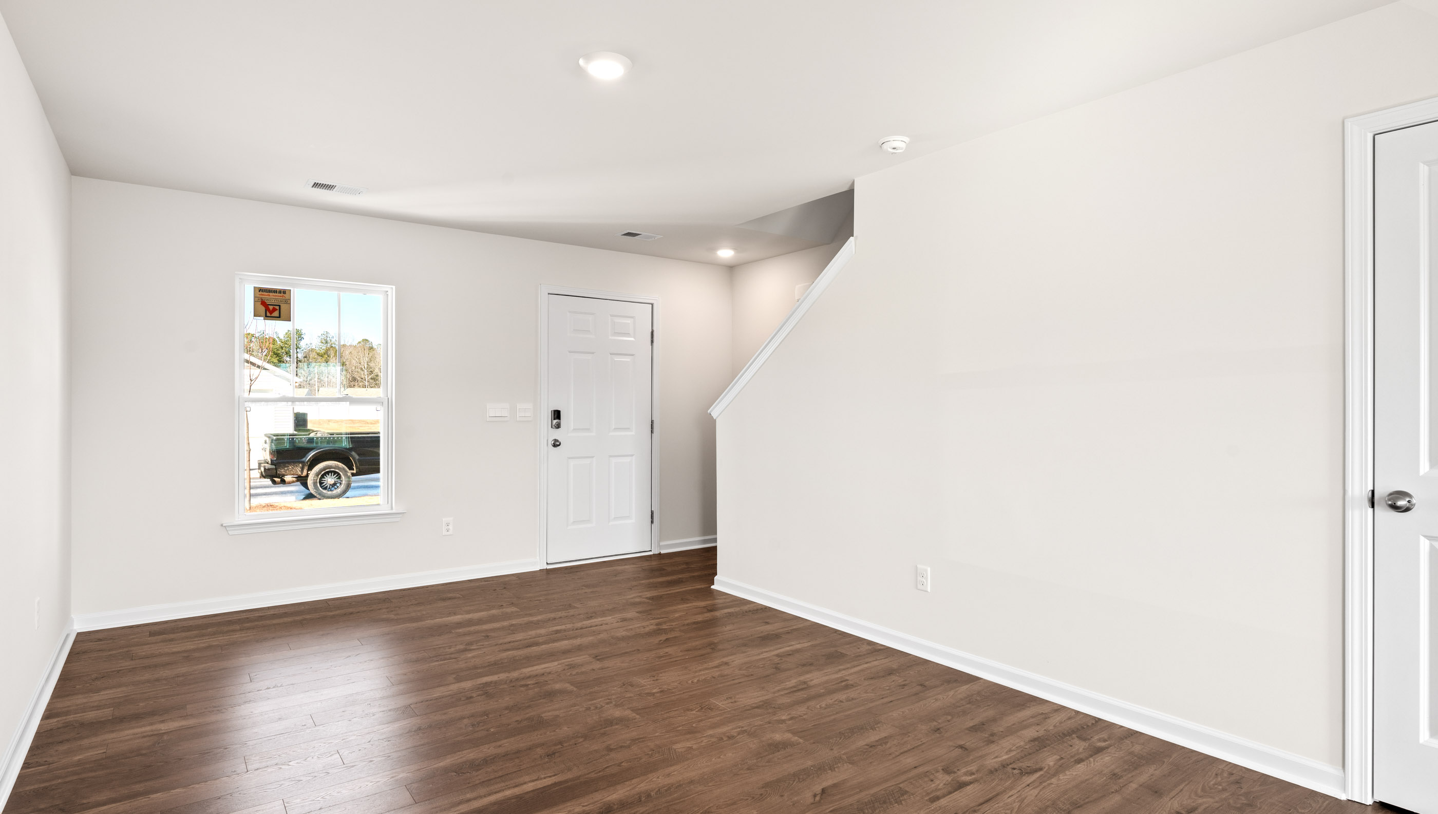 View of family room and front door.