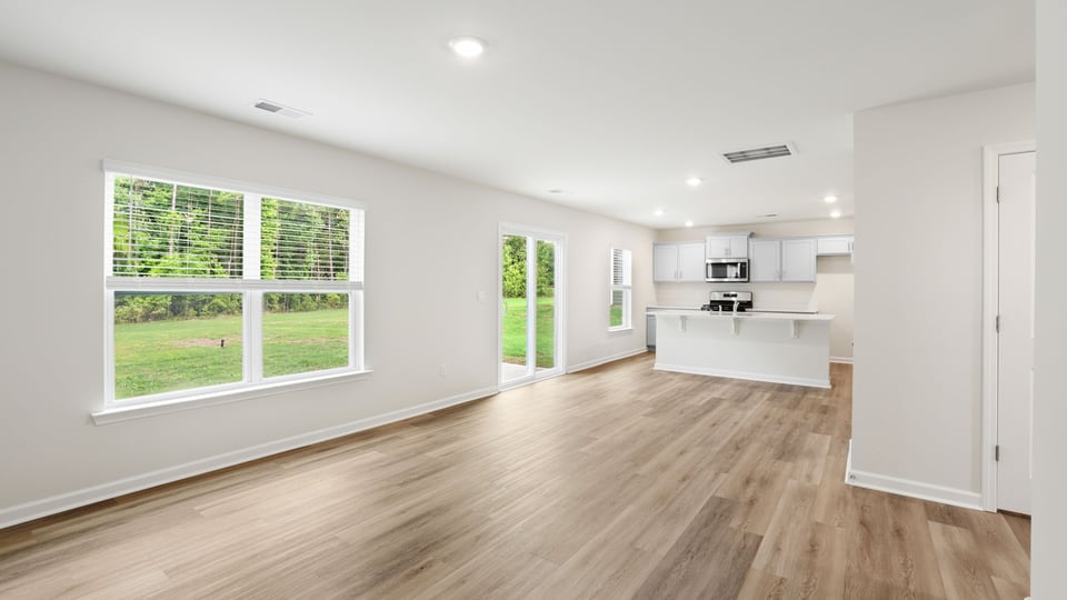 Family room with view of kitchen.