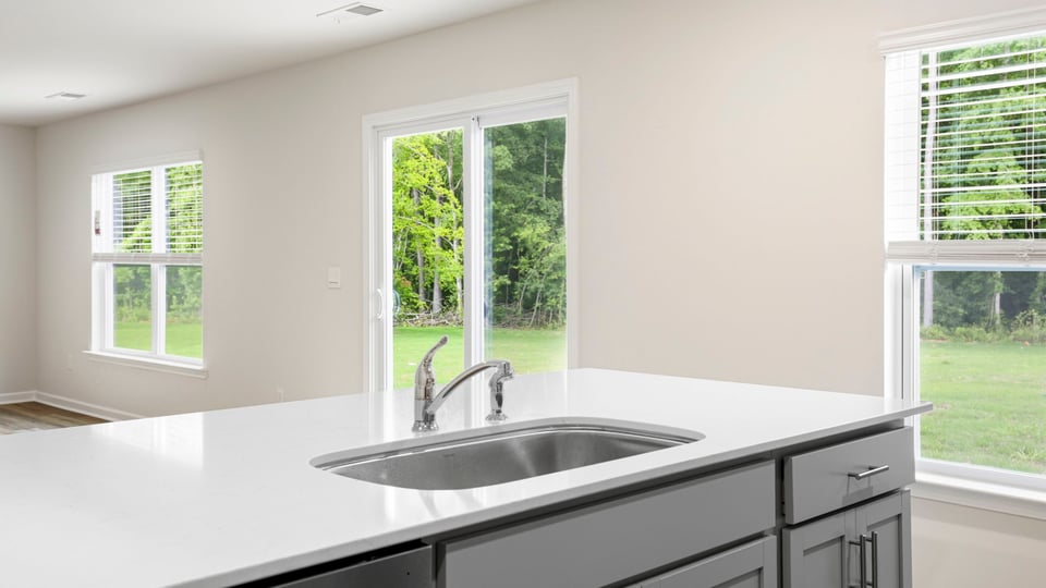 Kitchen with stainless steel appliances.