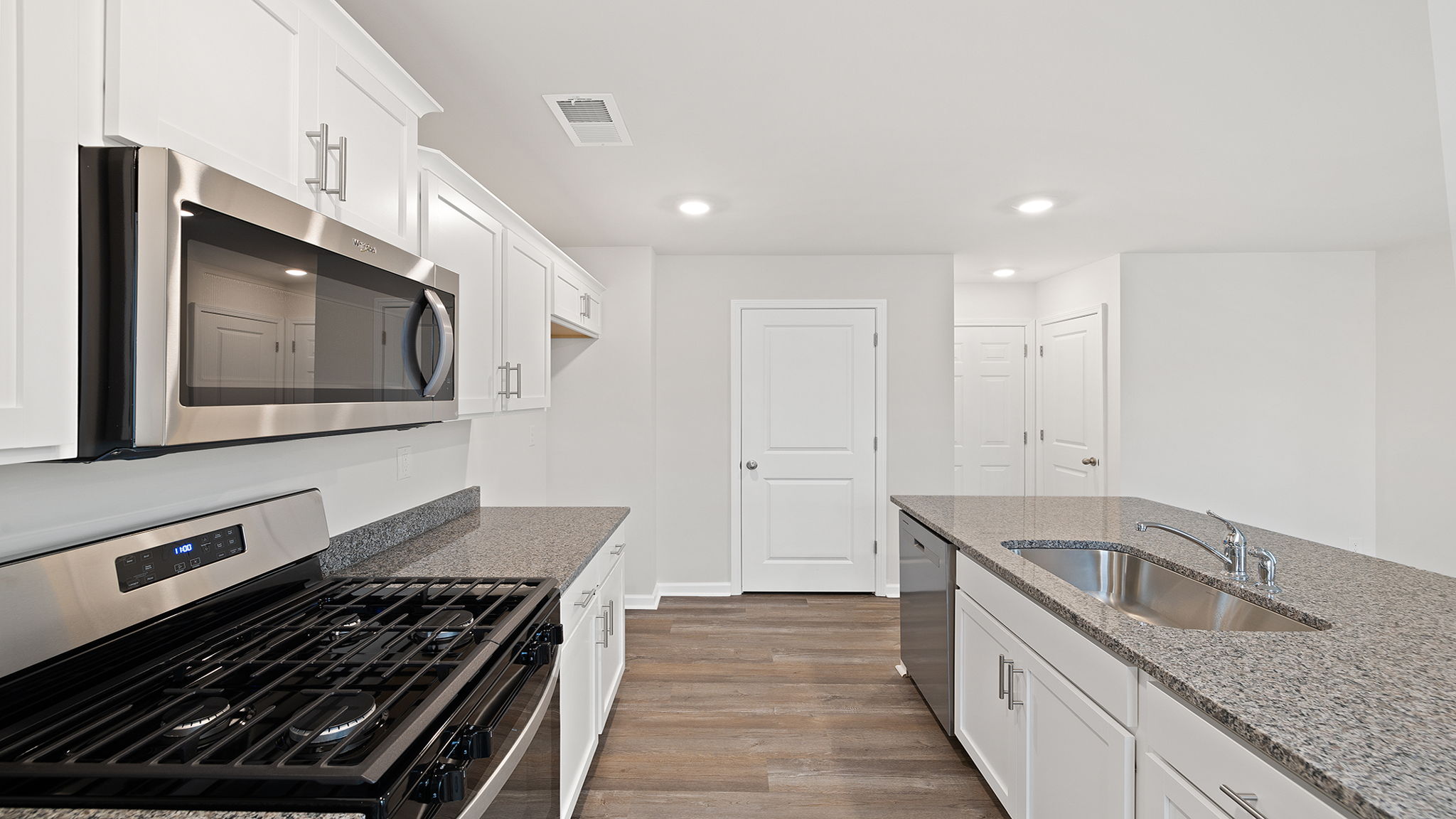View of kitchen and island.