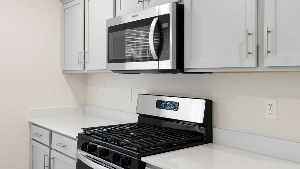 Kitchen with stainless steel appliances.