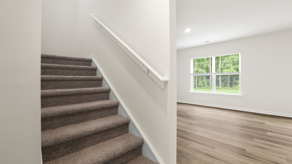 Stairs to bedrooms.