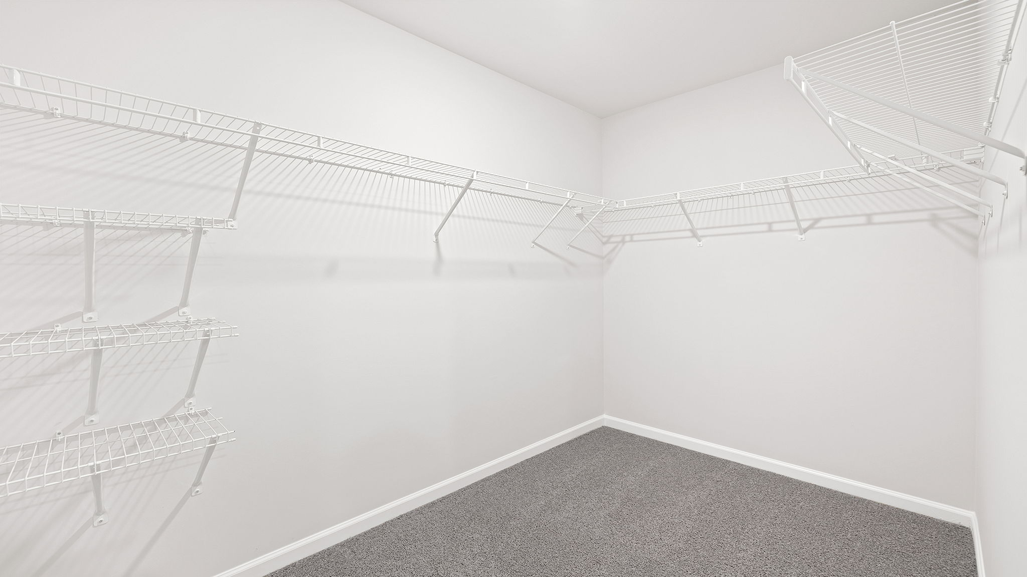 Primary bedroom walk-in closet.