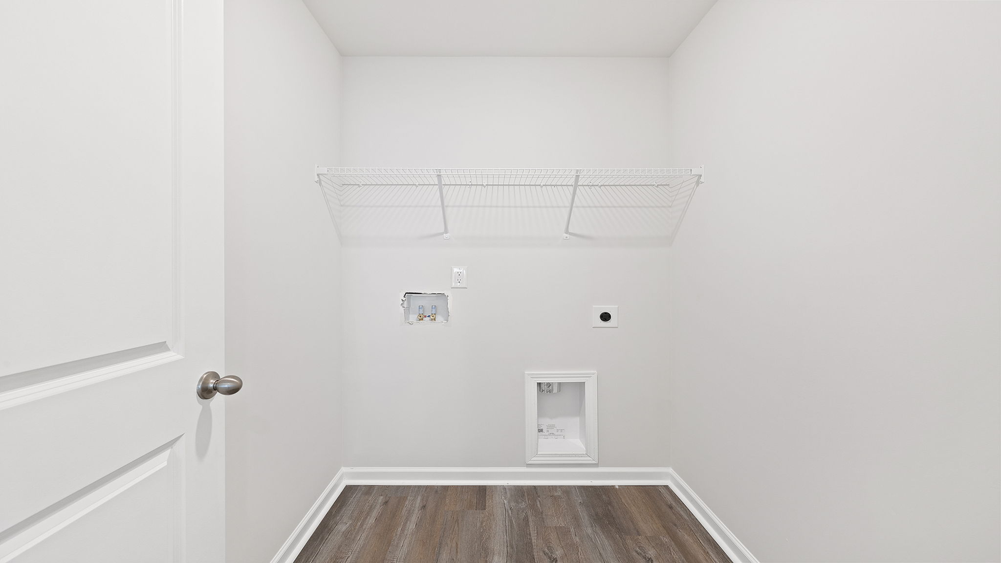 Walk-in laundry room.